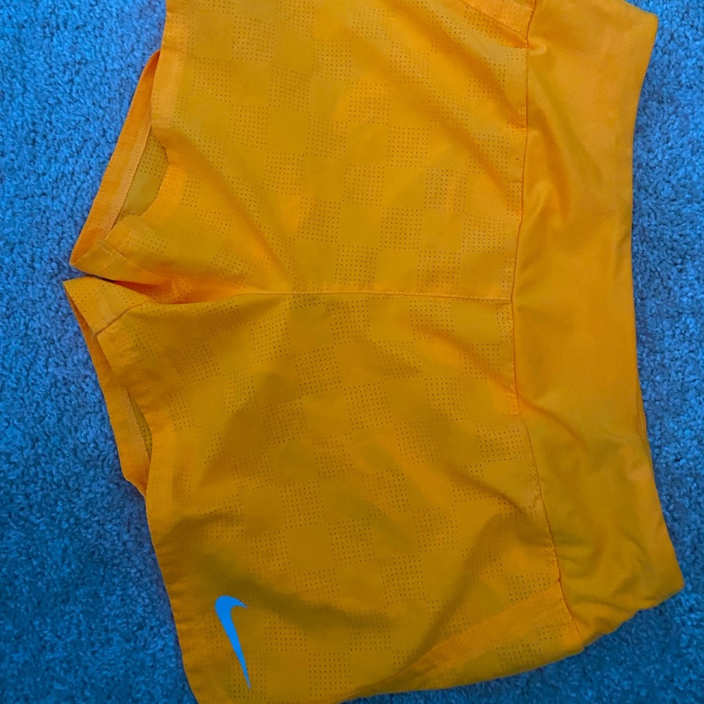 Bright orange Nike shorts
